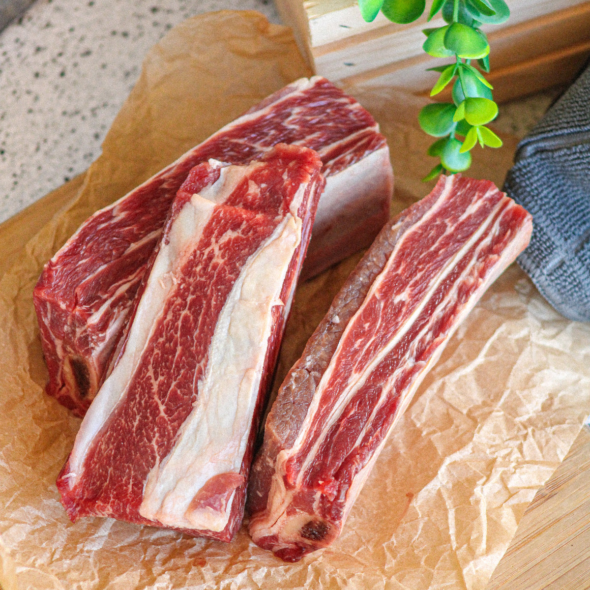 Raw grass-fed beef short ribs on butcher paper – Waseda Farms
